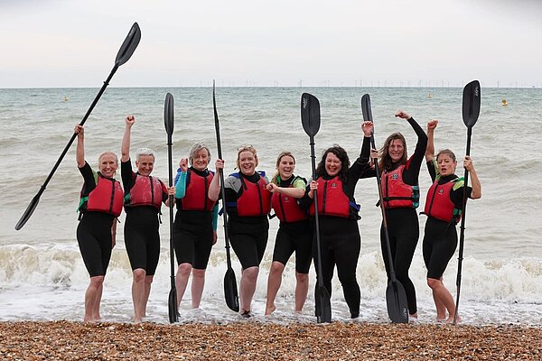 Alex with fellow rowers celebrating after the race.