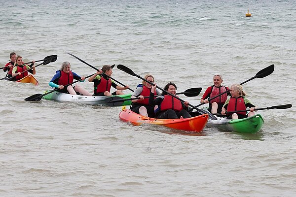 Alex in a canoe race with fellow female Lib Dem MPs