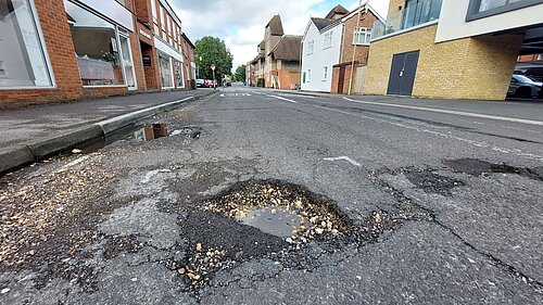 A  large pothole in Upper Street, Fleet.